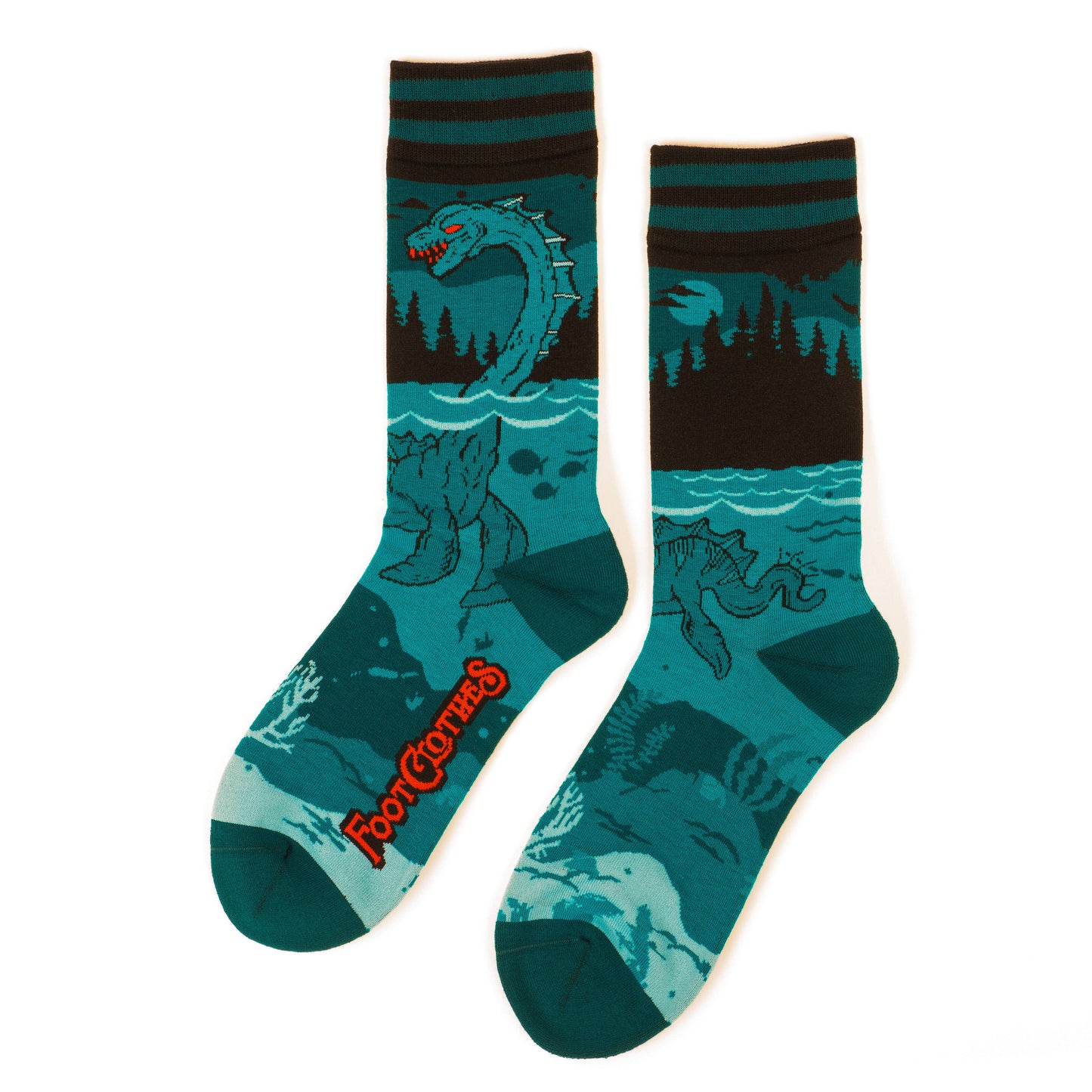 A pair of socks featuring the Loch Ness Monster. Blue legs, blue heel, toe and cuff.