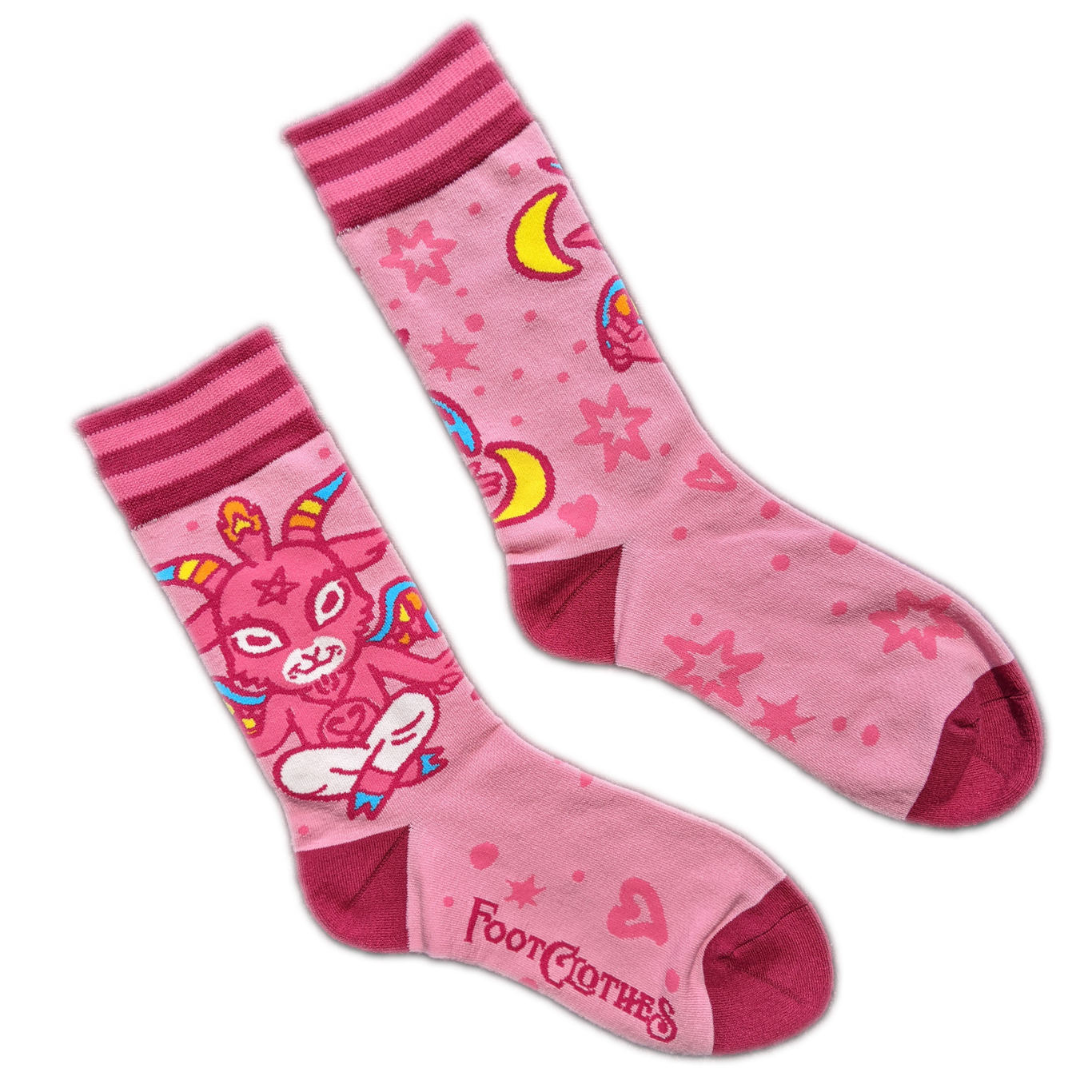 A pair of socks featuring a cute little devil. Pink legs, bright pink heel, toe and cuff.