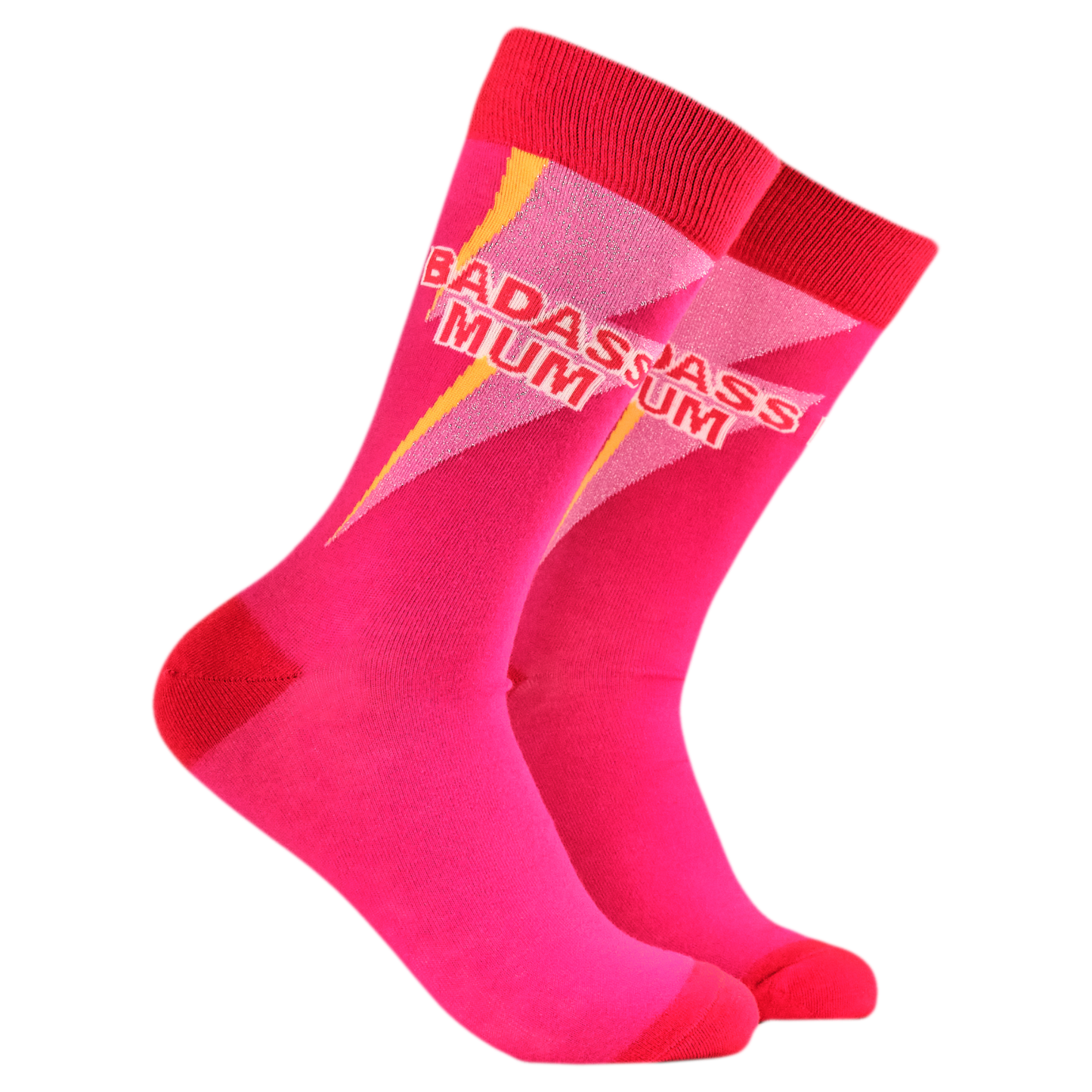 Badass Mum Socks. A pair of socks with he slogan Badass Mum. Pink legs, red heel, toe and cuff.