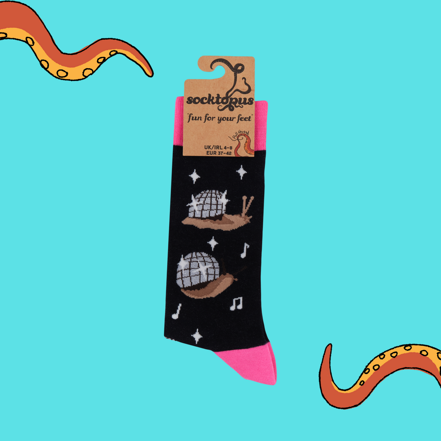 A pair of socks with a disco snail motif. Black legs, hot pink heel, toe and cuff.
