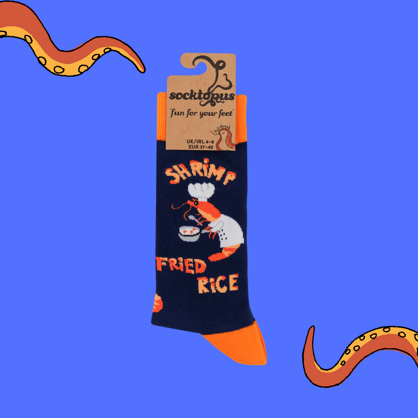 A pair of socks featuring a shrimp dressed as a chef. Dark blue legs, orange heel, toe and cuff.