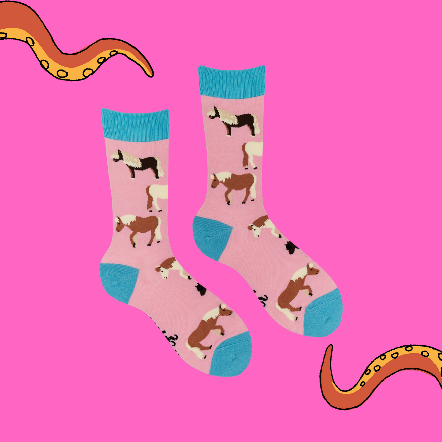 A pair of socks featuring cute ponies. Pink legs, blue heel, toe and cuff.