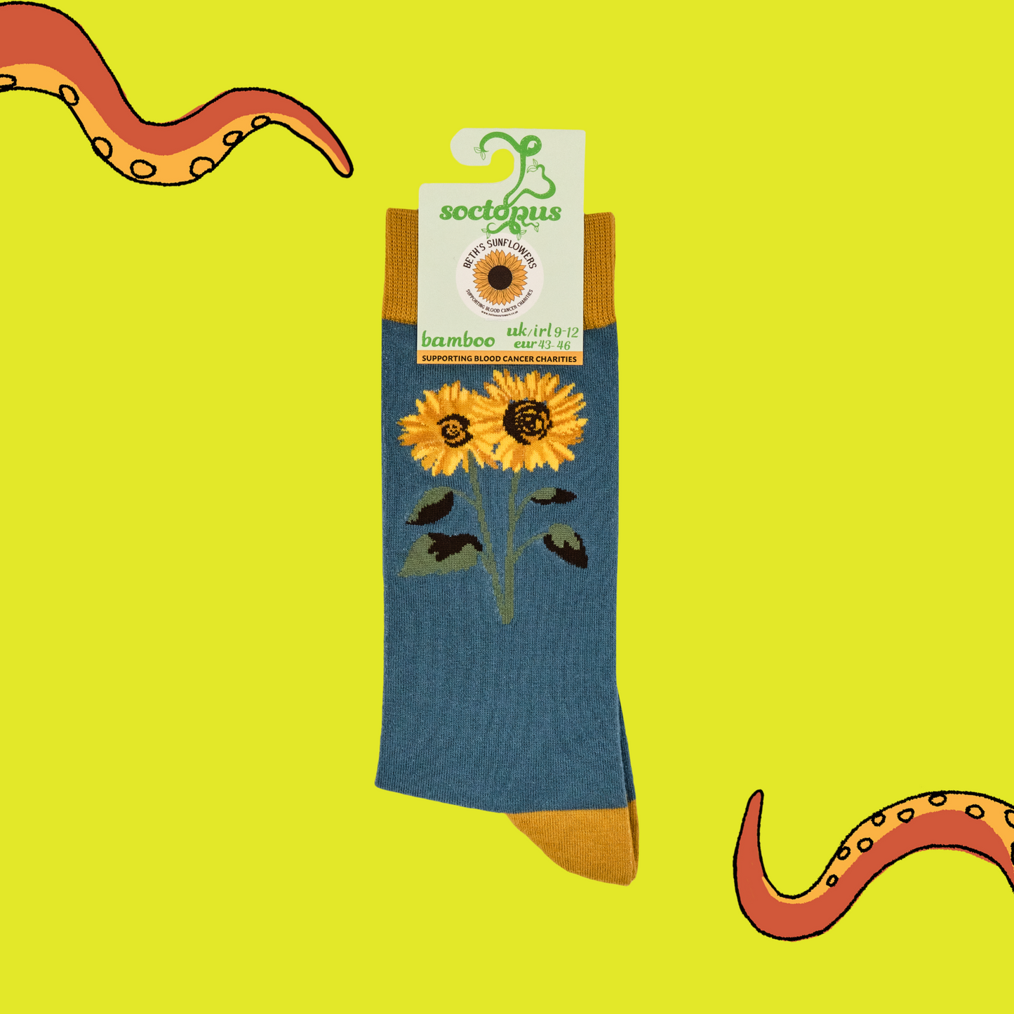 yellow socks with sunflower design on a blue background