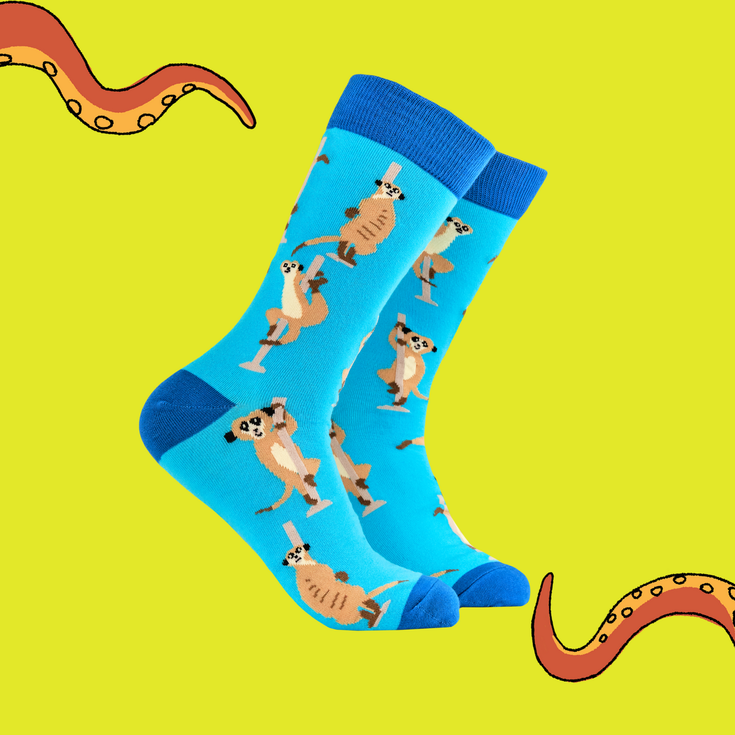 A pair of socks featuring pole dancing meerkats. Light blue legs, dark blue heel, toe and cuff.