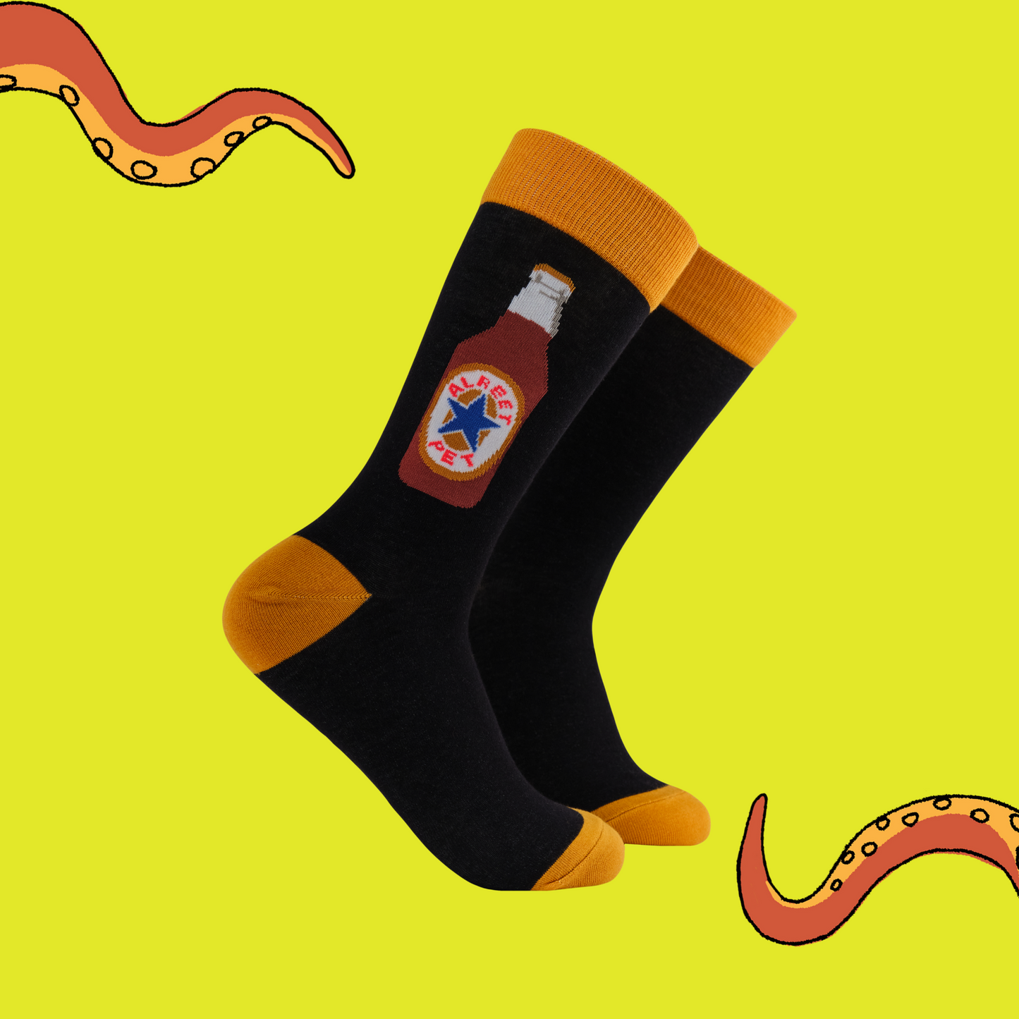 Alreet Pet Socks. A pair of black socks with a newcastle motif.