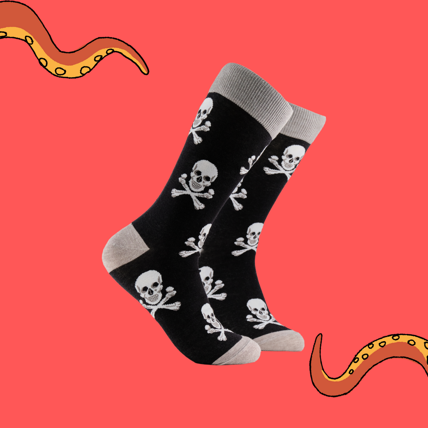A pair of socks depicting the skull and crossbones. Black legs, grey cuff, heel and toe.