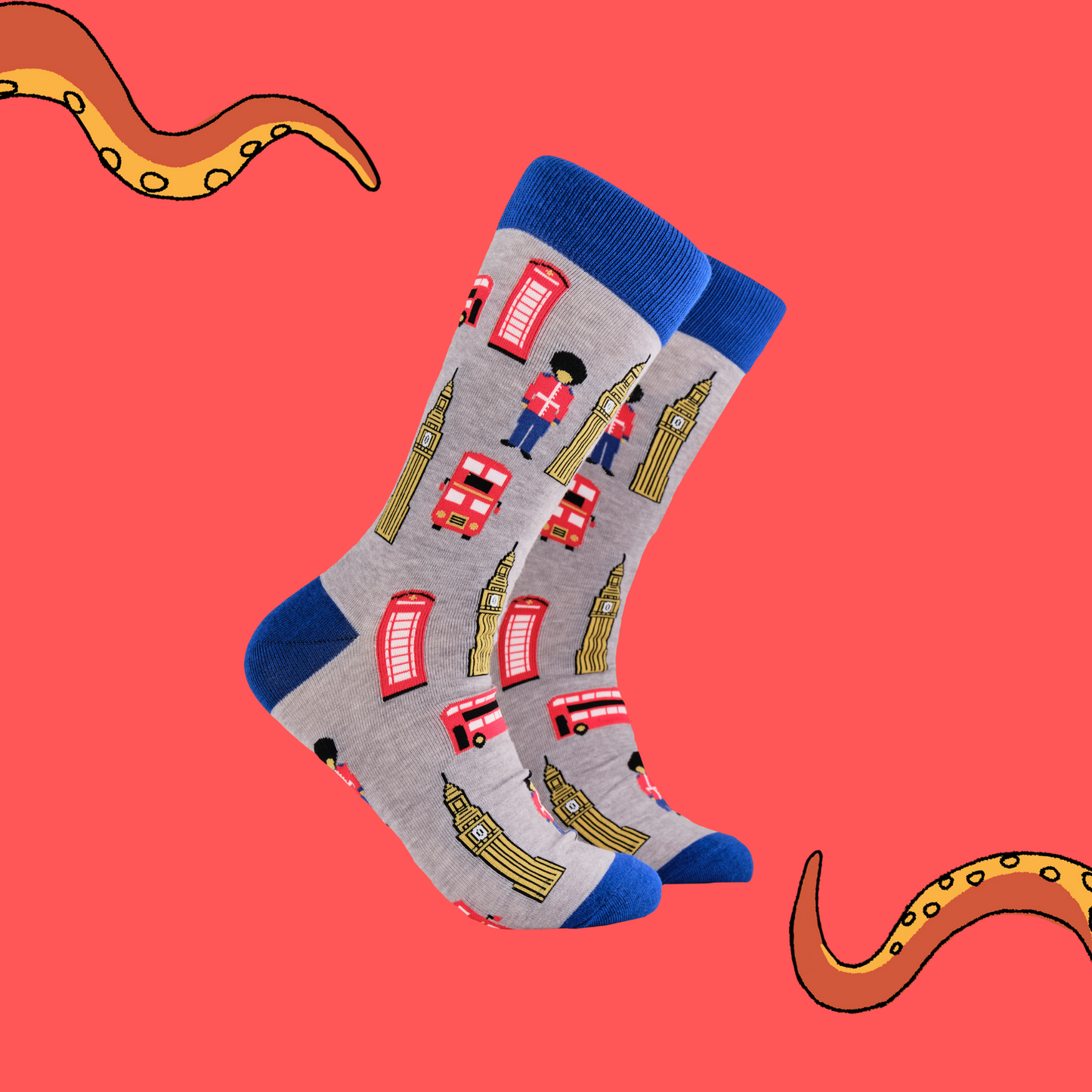A pair of socks depicting London icons. Grey legs, blue cuff, heel and toe.
