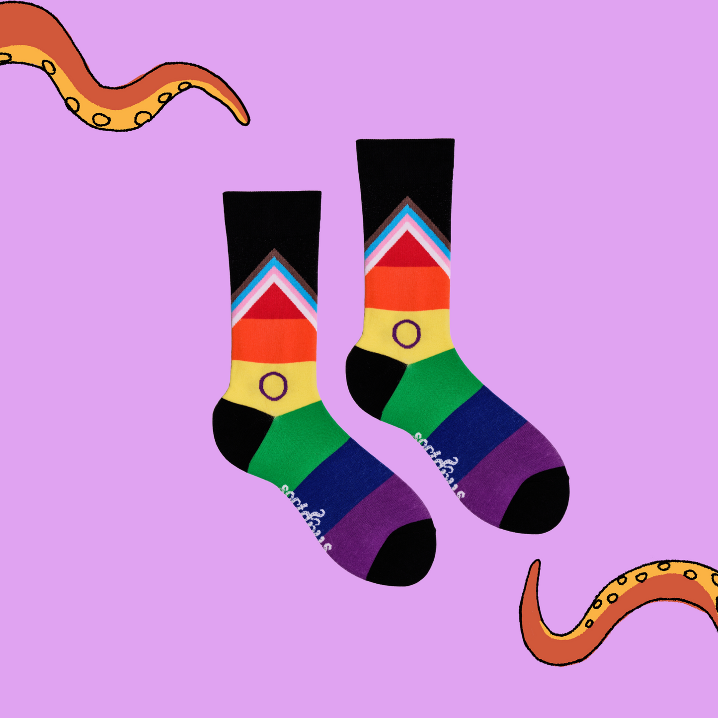 A pair of rainbow socks with an LGBTQ+ motif.
