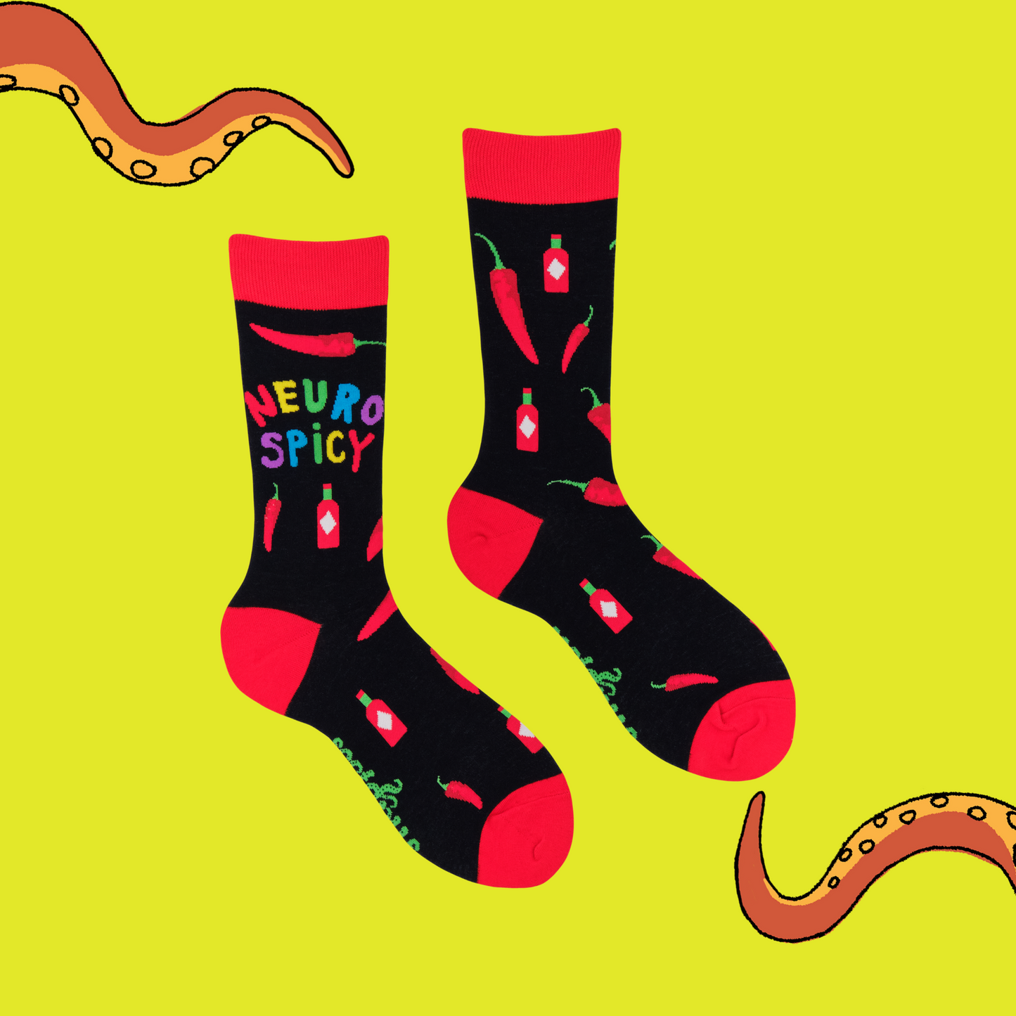 A pair of socks that celebrate your spicy brain. Black legs, red heel, toe and cuff.