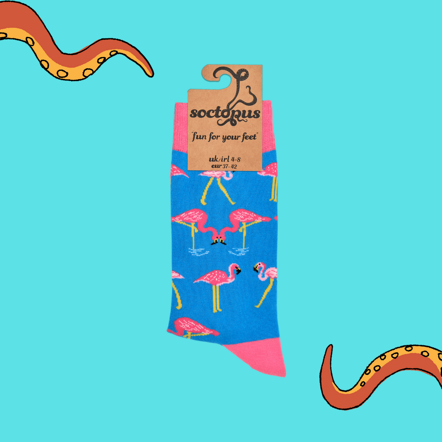 A pair of socks depicting flamingos. Light blue legs, pink cuff, heel and toe. In Soctopus Packaging.