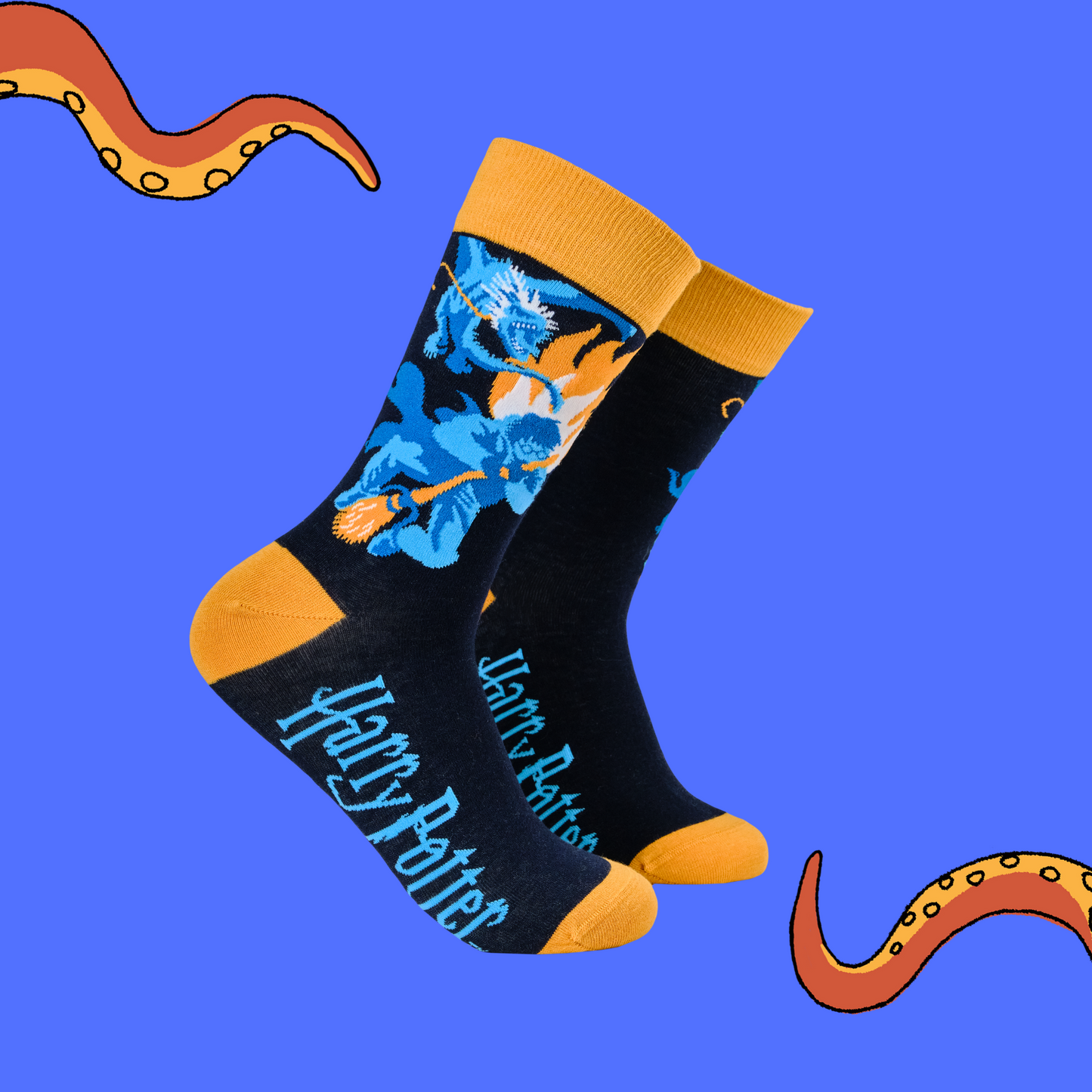 A pair of socks depicting harry Potter being chased by a dragon. Dark blue legs, yellow heel toe and cuff.