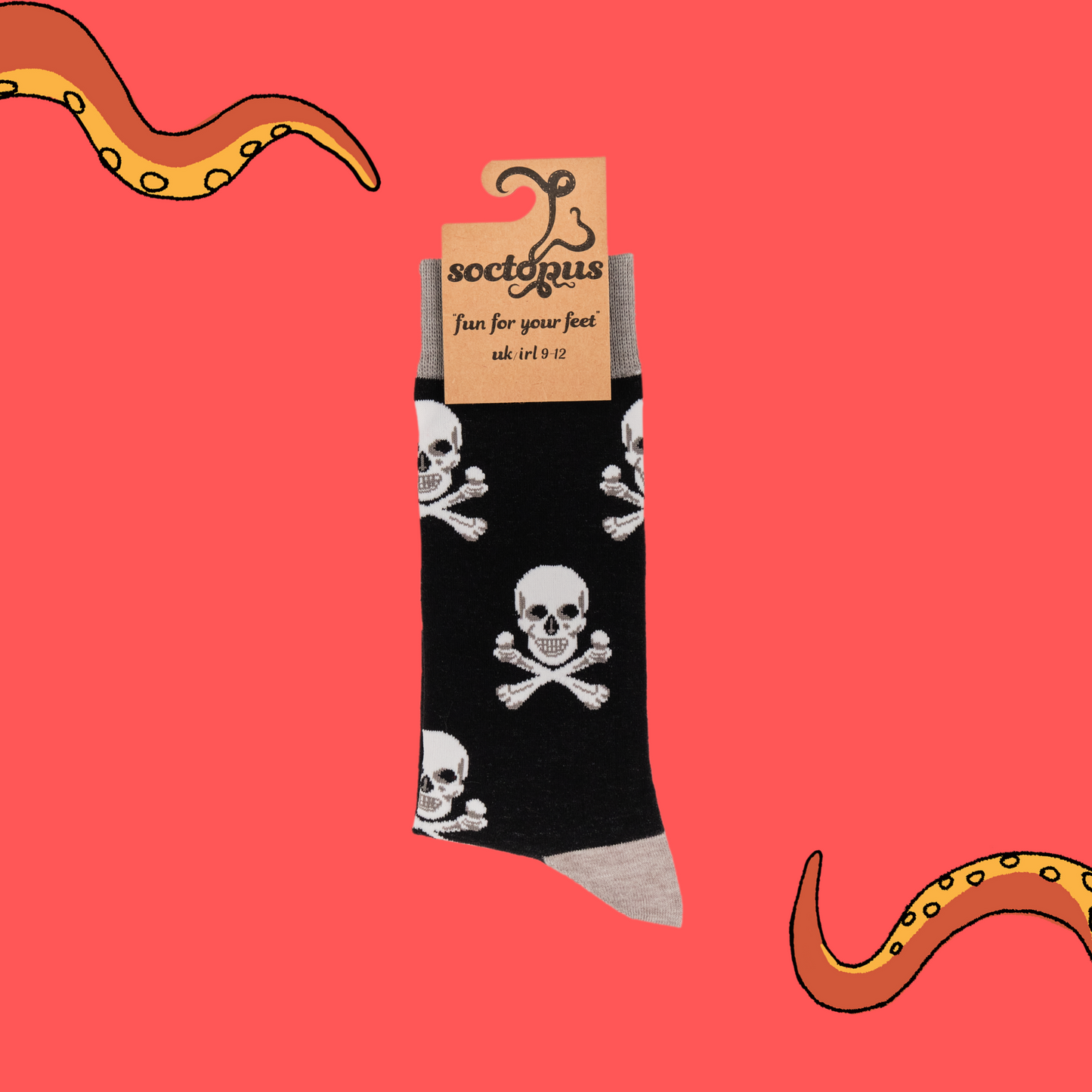 A pair of socks depicting the skull and crossbones. Black legs, grey cuff, heel and toe. In Soctopus Packaging.