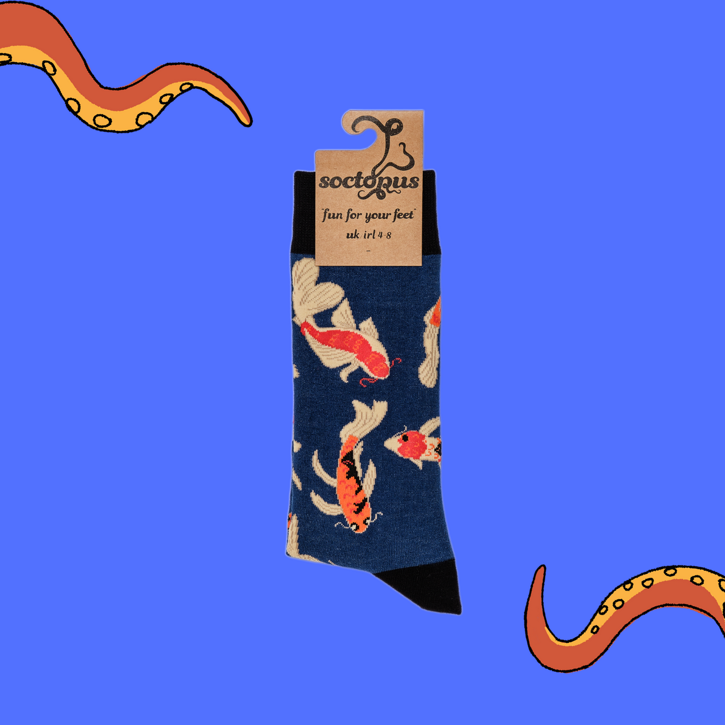 A pair of socks depicting Koi Carp. Dark blue legs, black cuff, heel and toe. In Soctopus Packaging.
