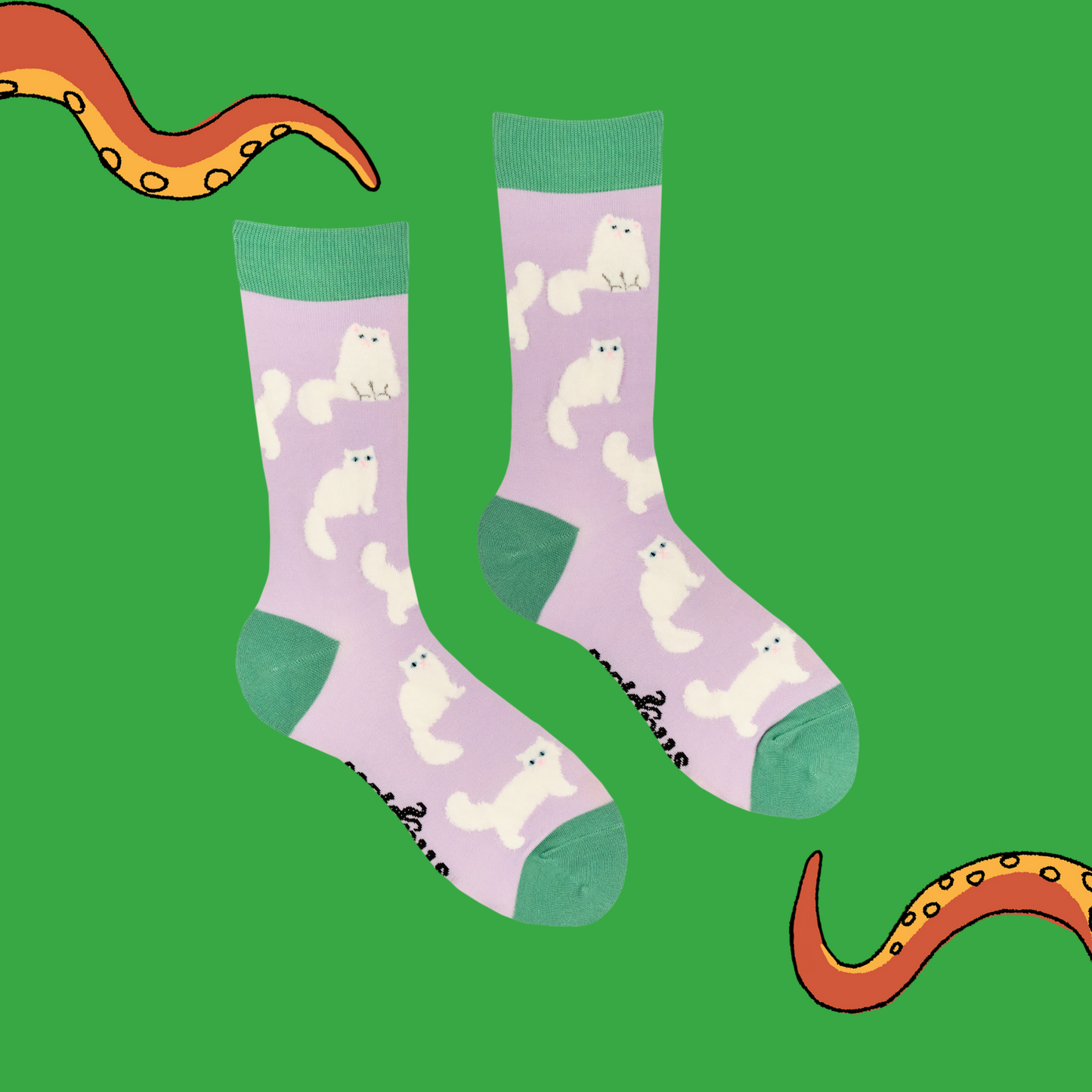 A pair of socks featuring fluffy white cats. Light pink legs, green heel, toe and cuff.