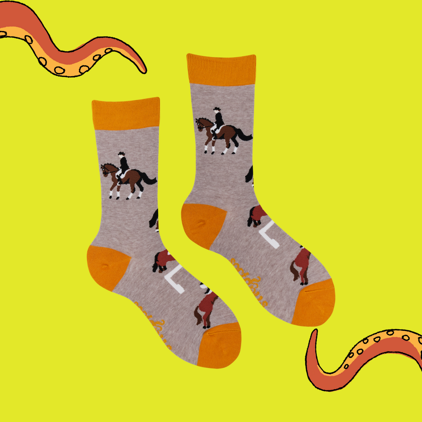 A pair of socks featuring show panies. Grey legs, yellow heel, toe and cuff.