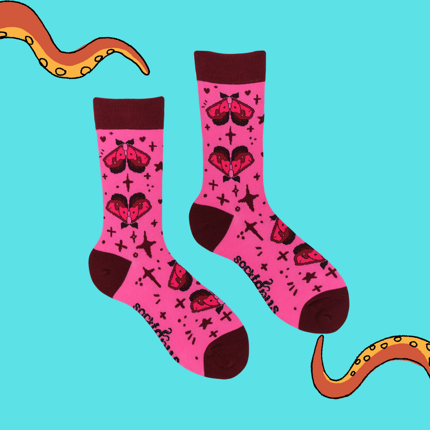 A pair of socks in collaboration with Tied fates. Moth pattern and pink details.