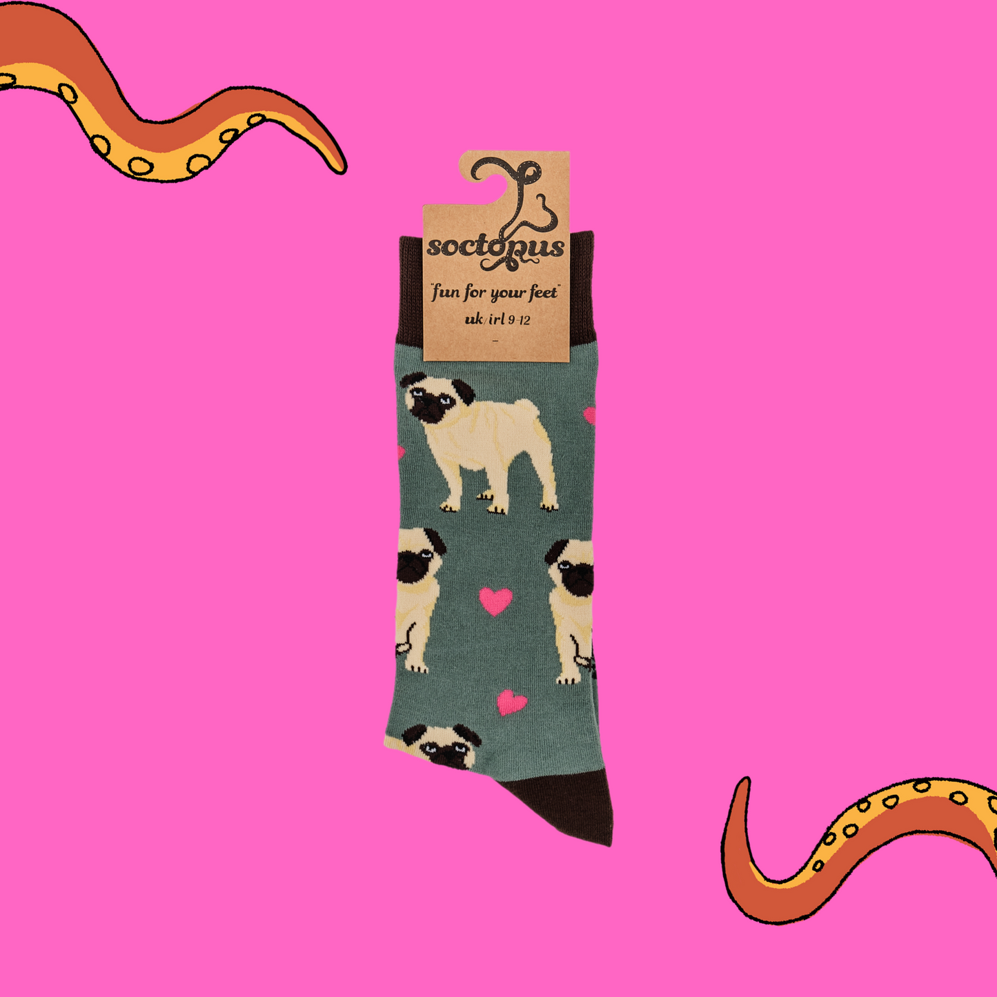 A pair of socks depicting hearts and pugs. Green legs, brown cuff, heel and toe In Soctopus Packaging.