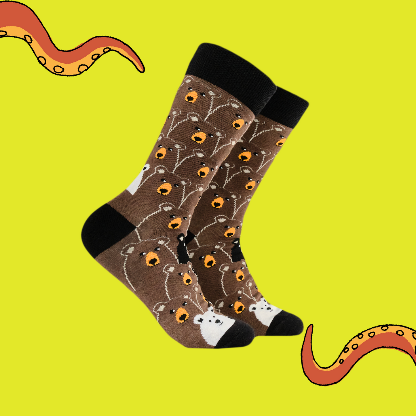 A pair of socks with a fun bear pattern. Brown legs, black heel, toe and cuff.