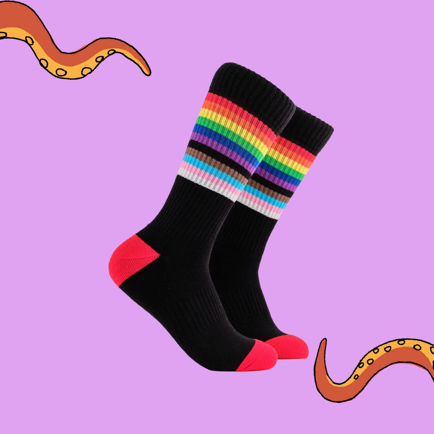 A pair of socks depicting the pride flag. Black legs, black cuff, red heel and toe.