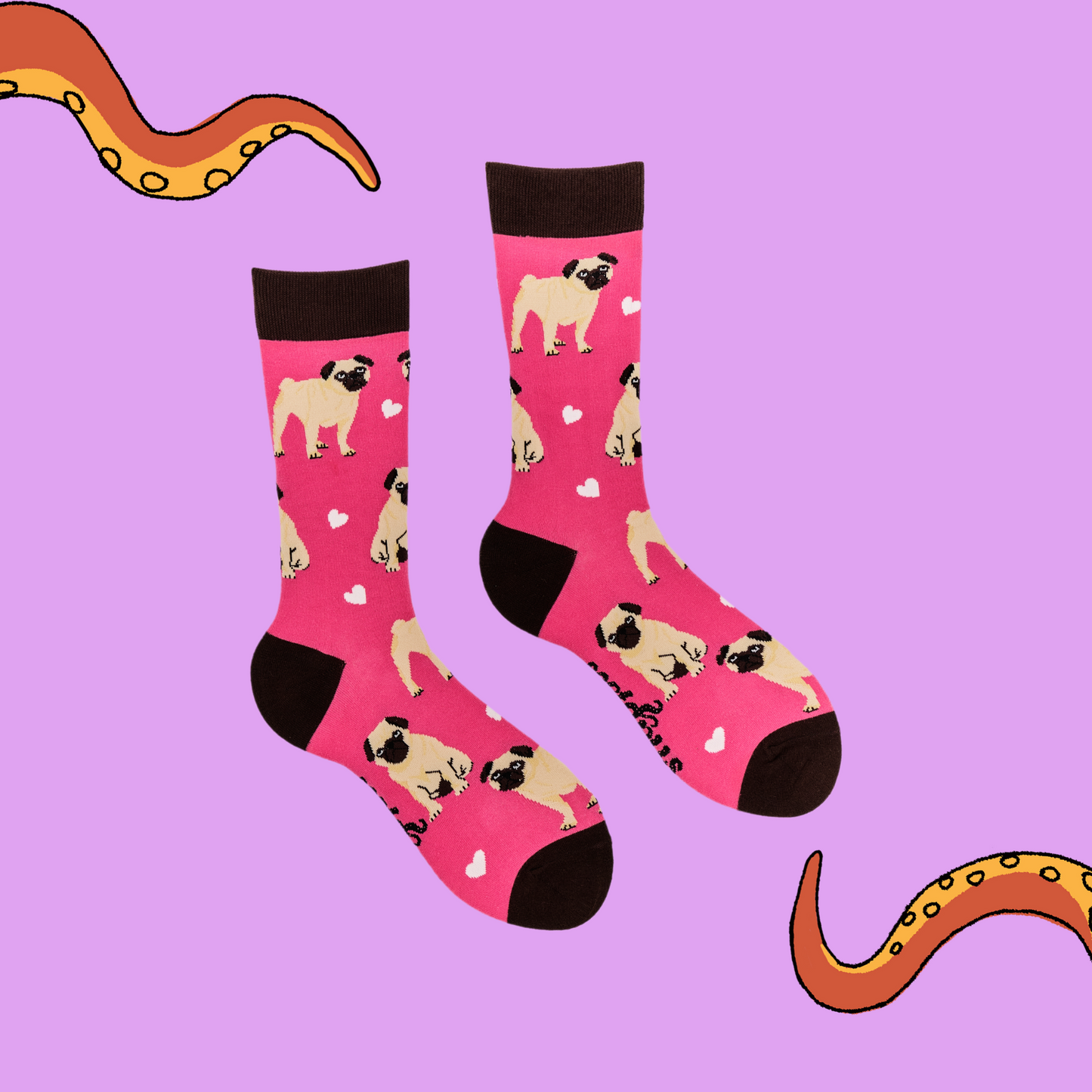 A pair of socks depicting hearts and pugs. Pink legs, brown cuff, heel and toe.