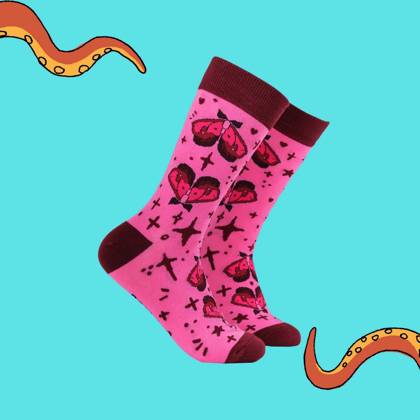 A pair of socks in collaboration with Tied fates. Moth pattern and pink details.