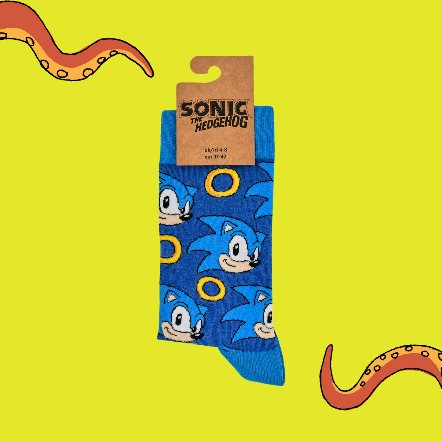 A pair of socks featuring Sonic with power rings. Dark blue legs, light blue heel, cuff and toe.