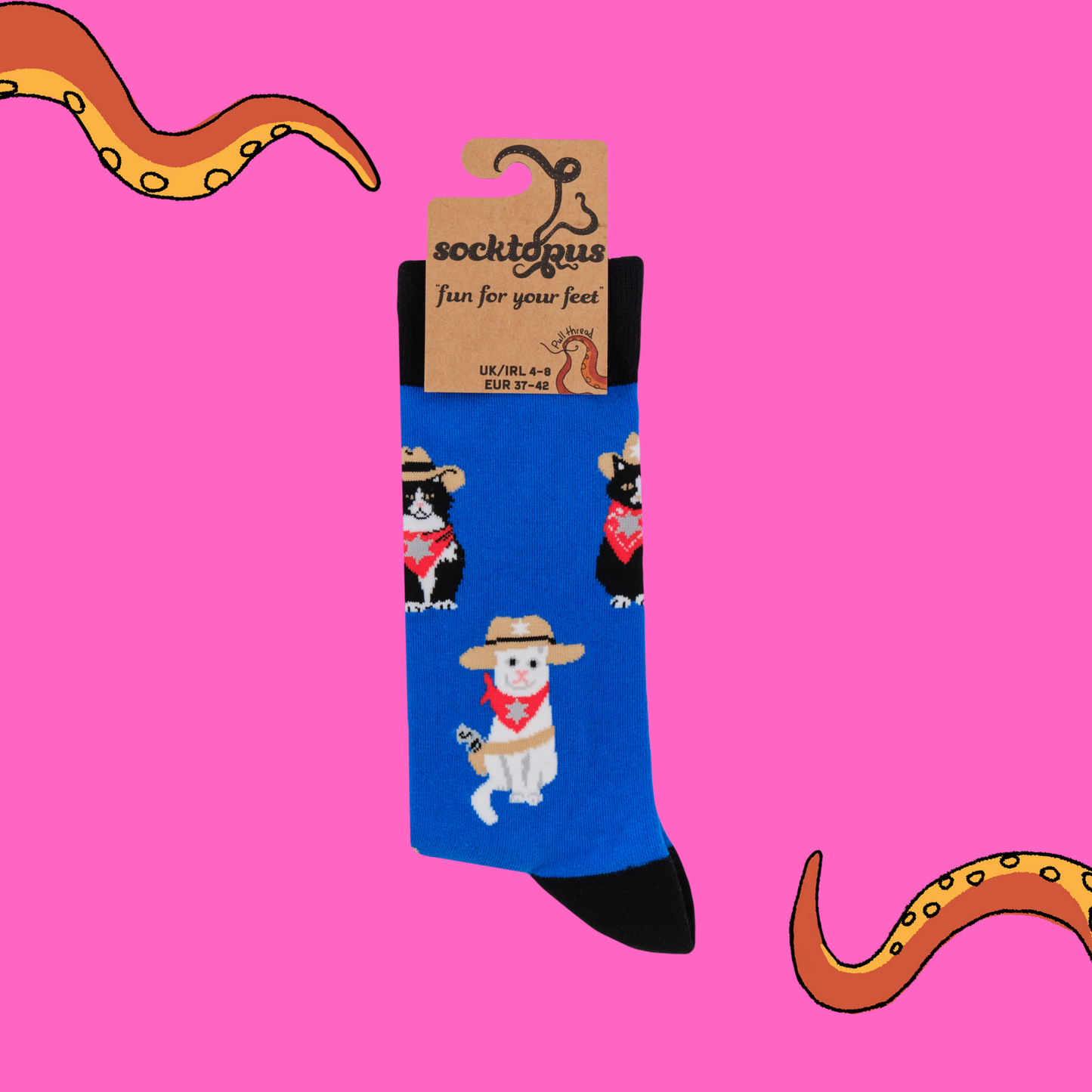 A pair of socks featuring a cat with a sheriff's outfit. Blue legs, black heel, toe and cuff.