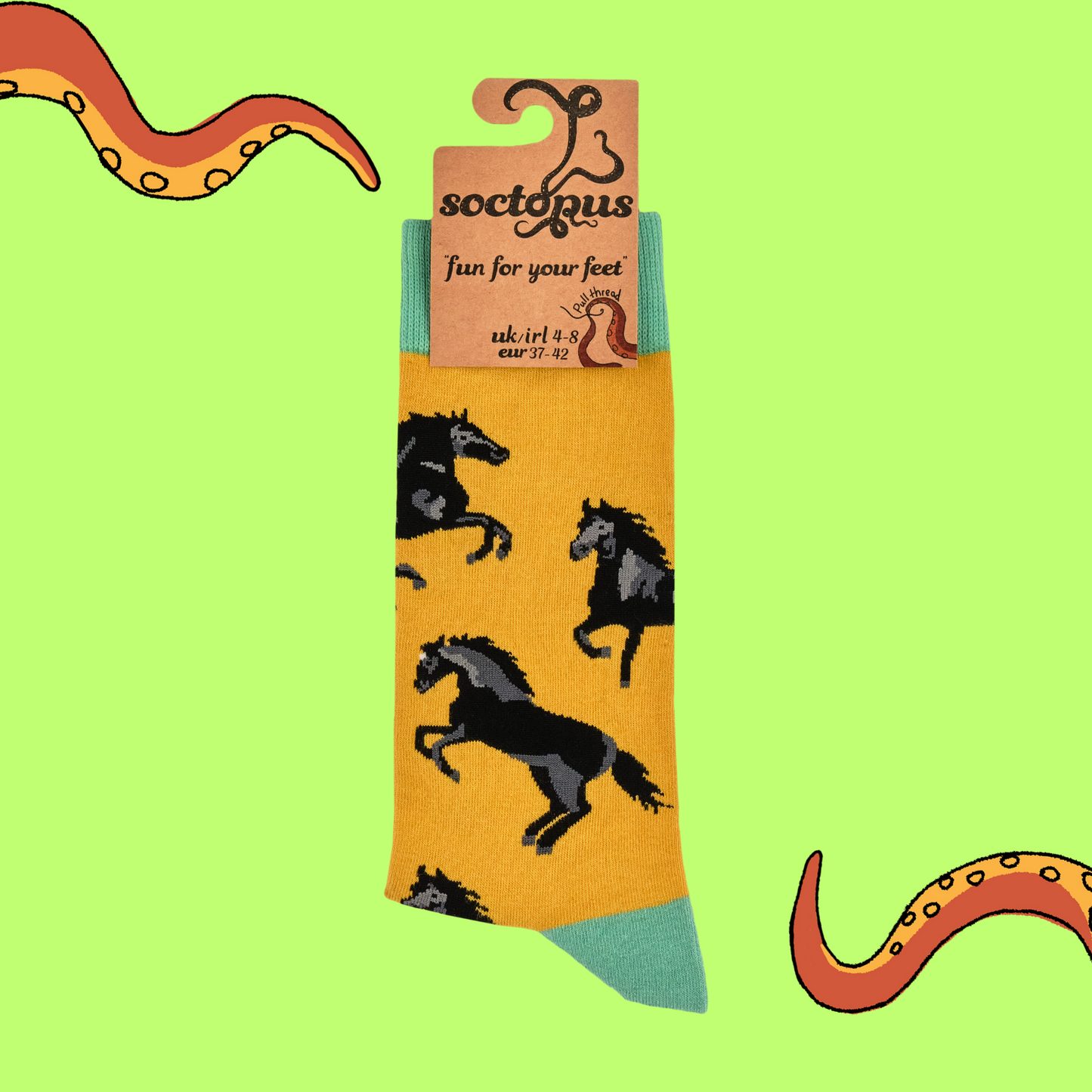 A pair of socks with a black stallion motif. Yellow legs, green heel toe and cuff.