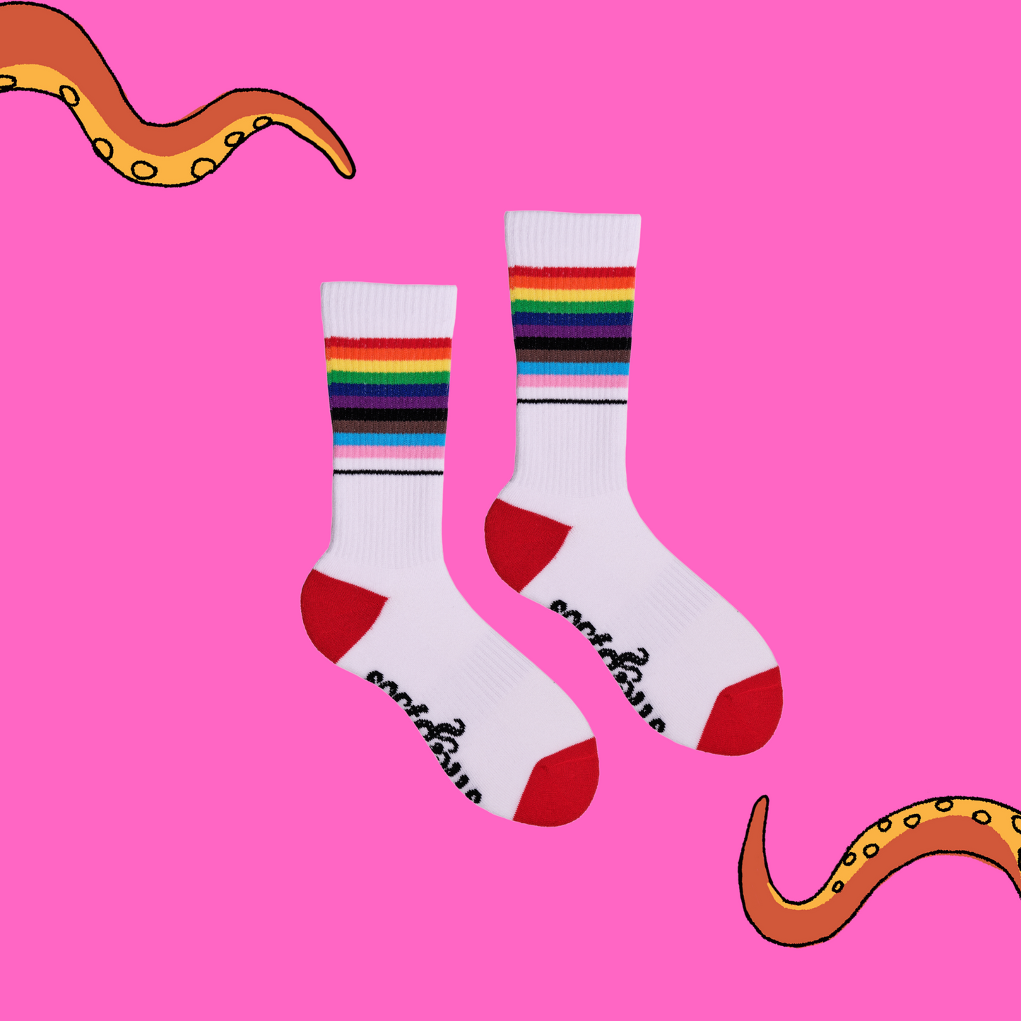 A pair of socks depicting the pride flag. White legs, white cuff, red heel and toe.