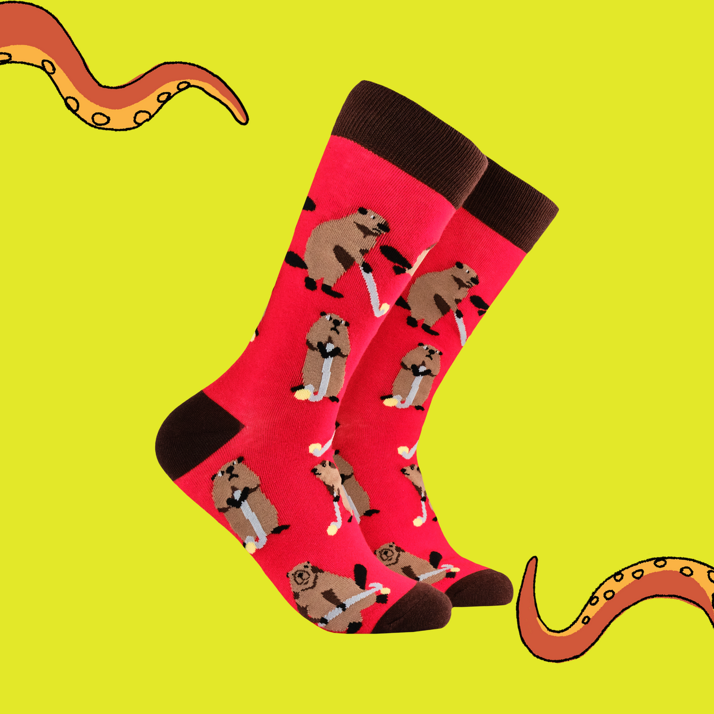 A pair of socks depicting a beaver playing hockey. Red legs, brown heel, toe and cuff.
