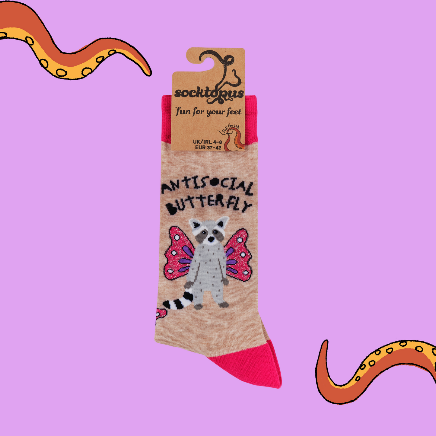 A pair of socks featuring a racoon and butterfly motif. Brown legs, hot pink heel toe and cuff.