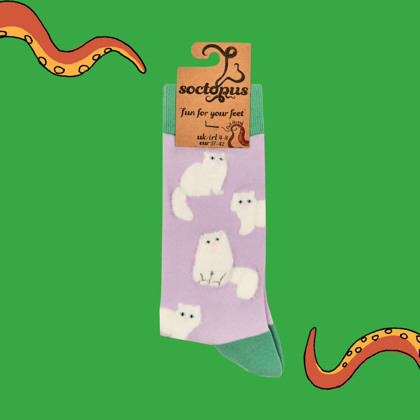 A pair of socks featuring fluffy white cats. Light pink legs, green heel, toe and cuff.