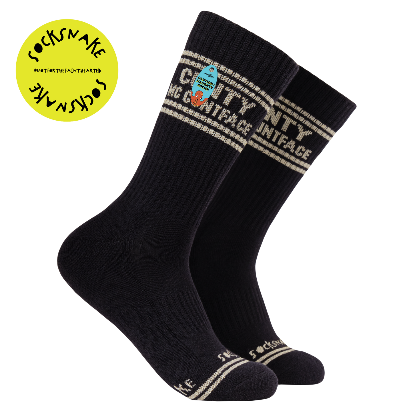 A black pair of athletic socks with white trim on the ankles and toes. With some very rude words on the ankle.