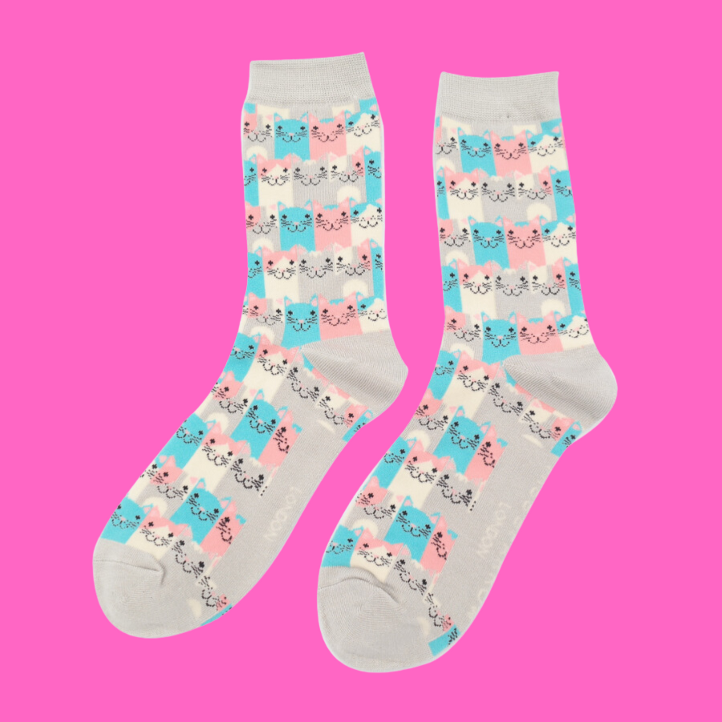 A pair of socks with a multicoloured happy anime cat pattern. Grey heel, toe and cuff.