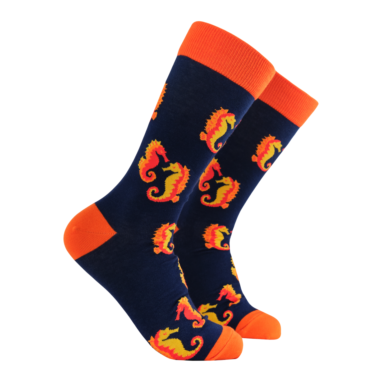 A pair of socks with a seahorse motif. Dark blue legs, red heel, toe and cuff.