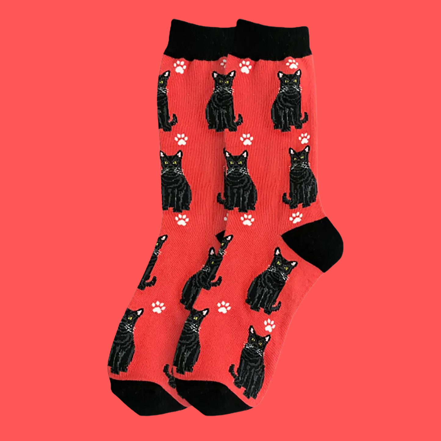 A pair of socks featuring black cats. Red legs, black heel, toe and cuff.