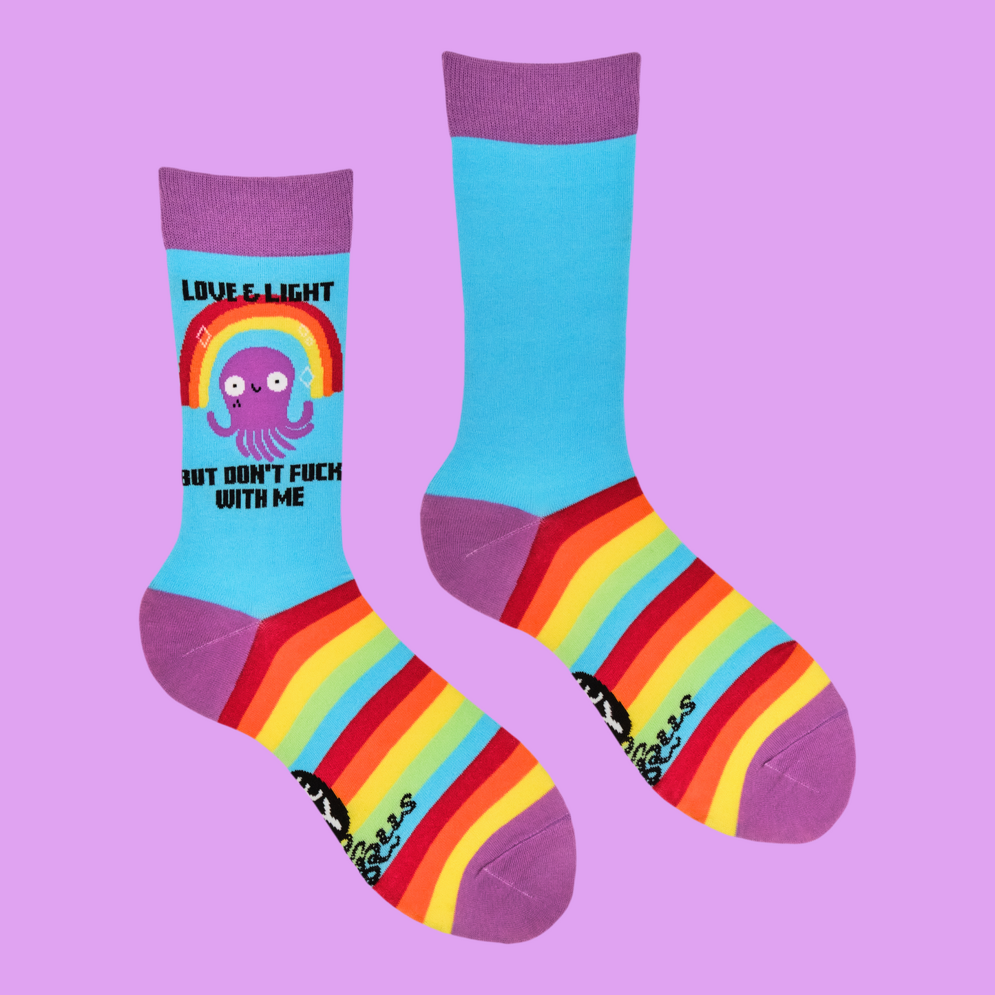 A pair of socks depicting a happy octopus and a sweary slogan. Blue legs. Striped foot and pink heel toe and cuff.