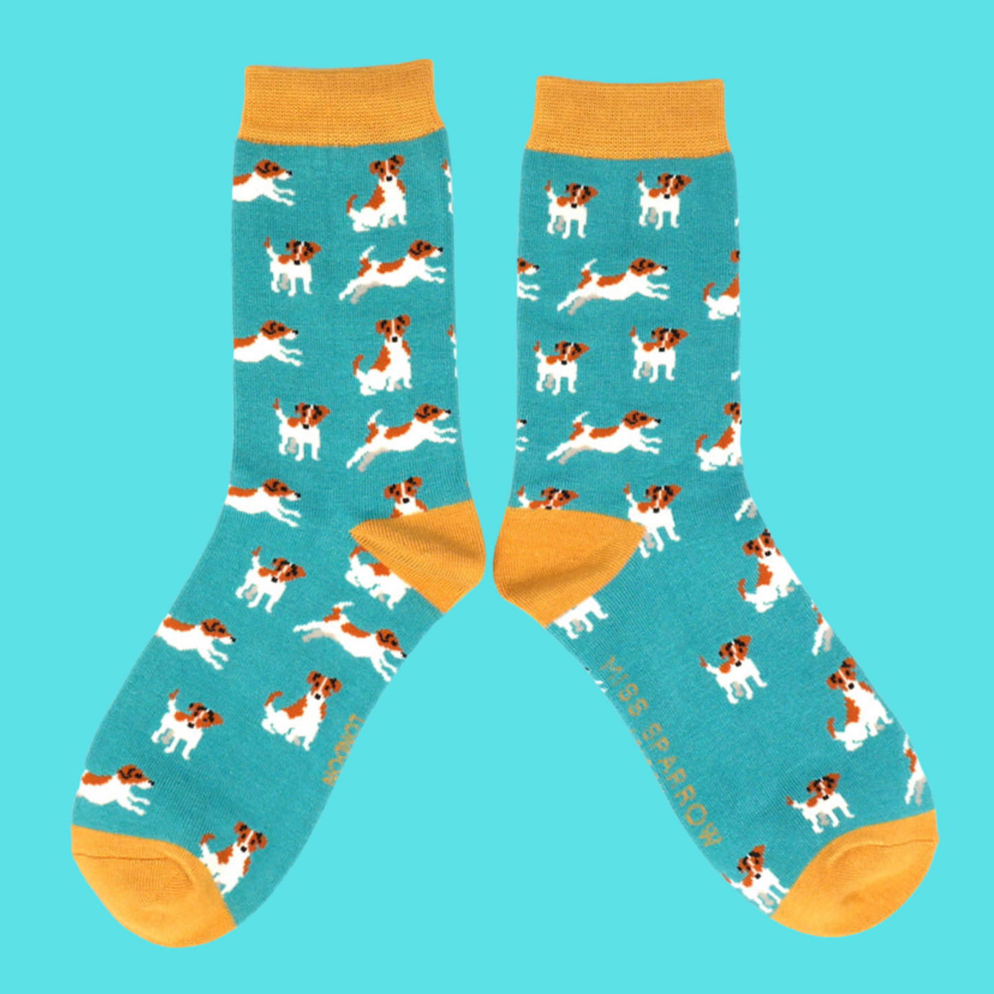 A pair of socks featuring a jack russell motif. Teal legs, orange heel, toe and cuff.