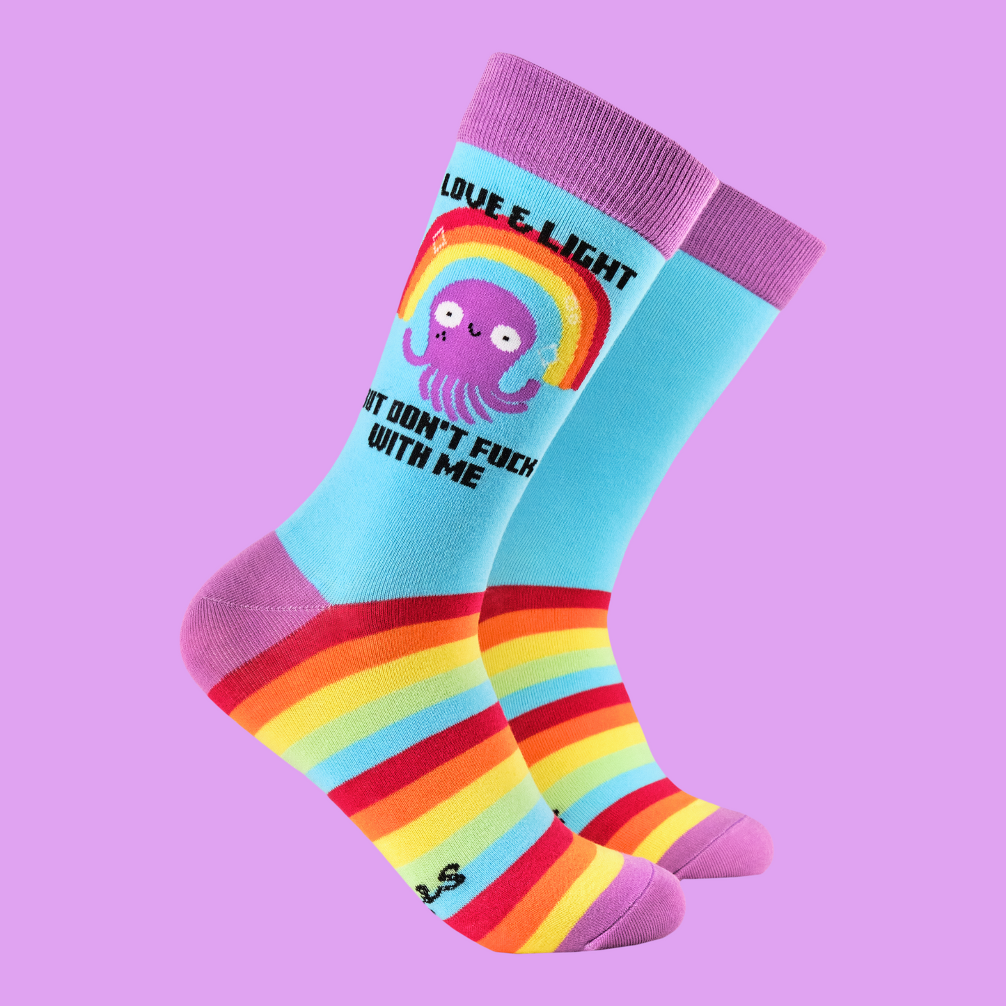 A pair of socks depicting a happy octopus and a sweary slogan. Blue legs. Striped foot and pink heel toe and cuff.