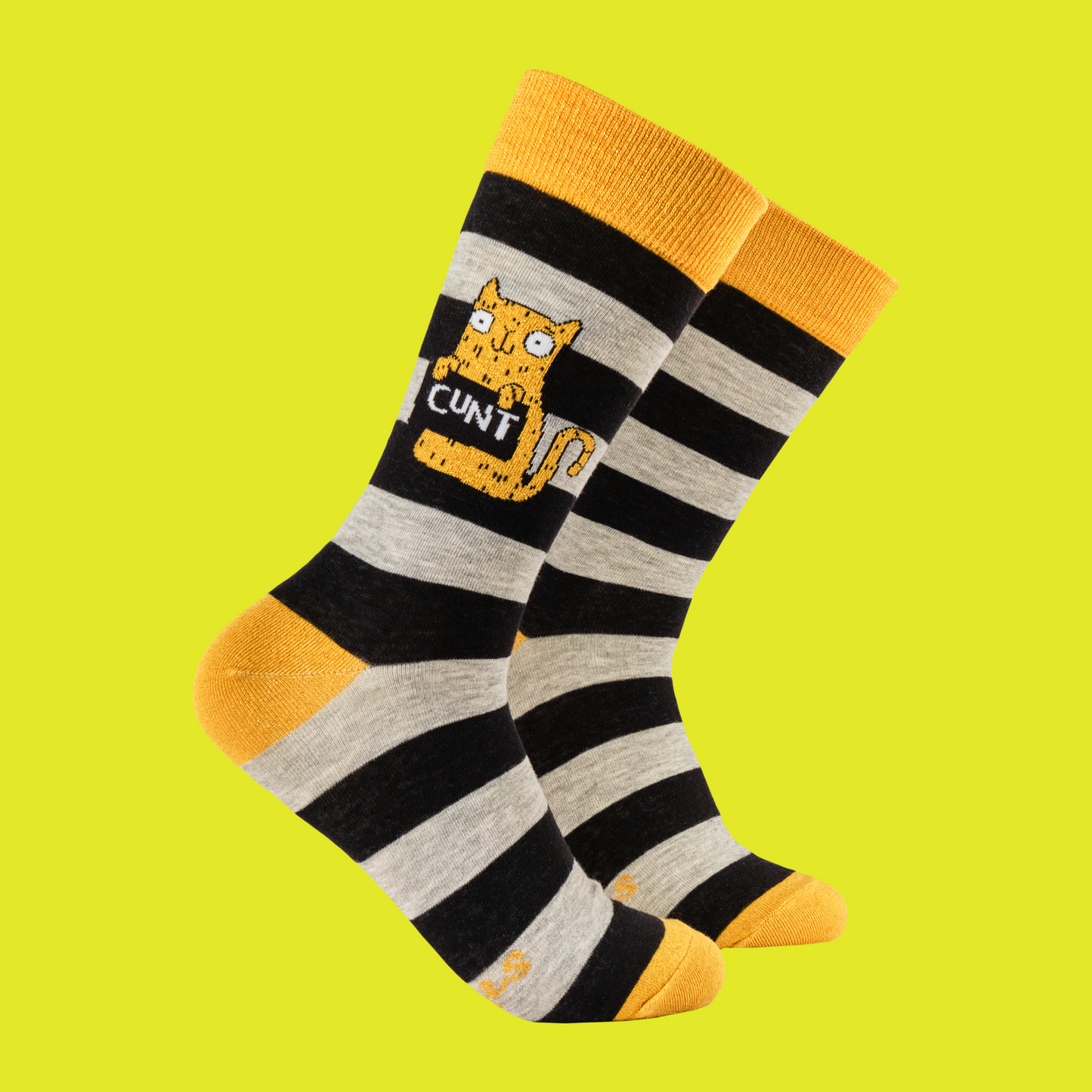A pair of socks featuring a cute cat holding a sweary sign. Black and grey striped legs. Yellow heel, cuff and toe.