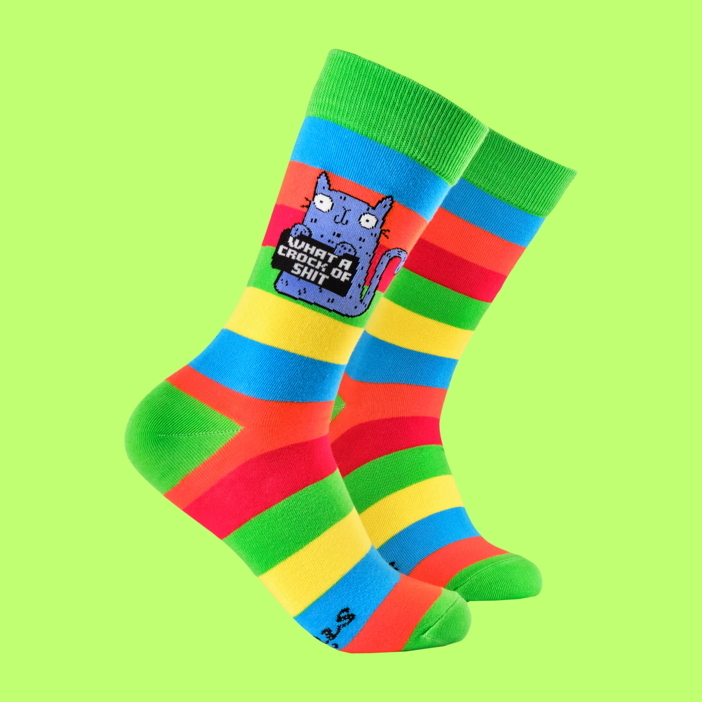 A pair of socks featuring a cute cat holding a sweary sign. Multicolored striped legs.