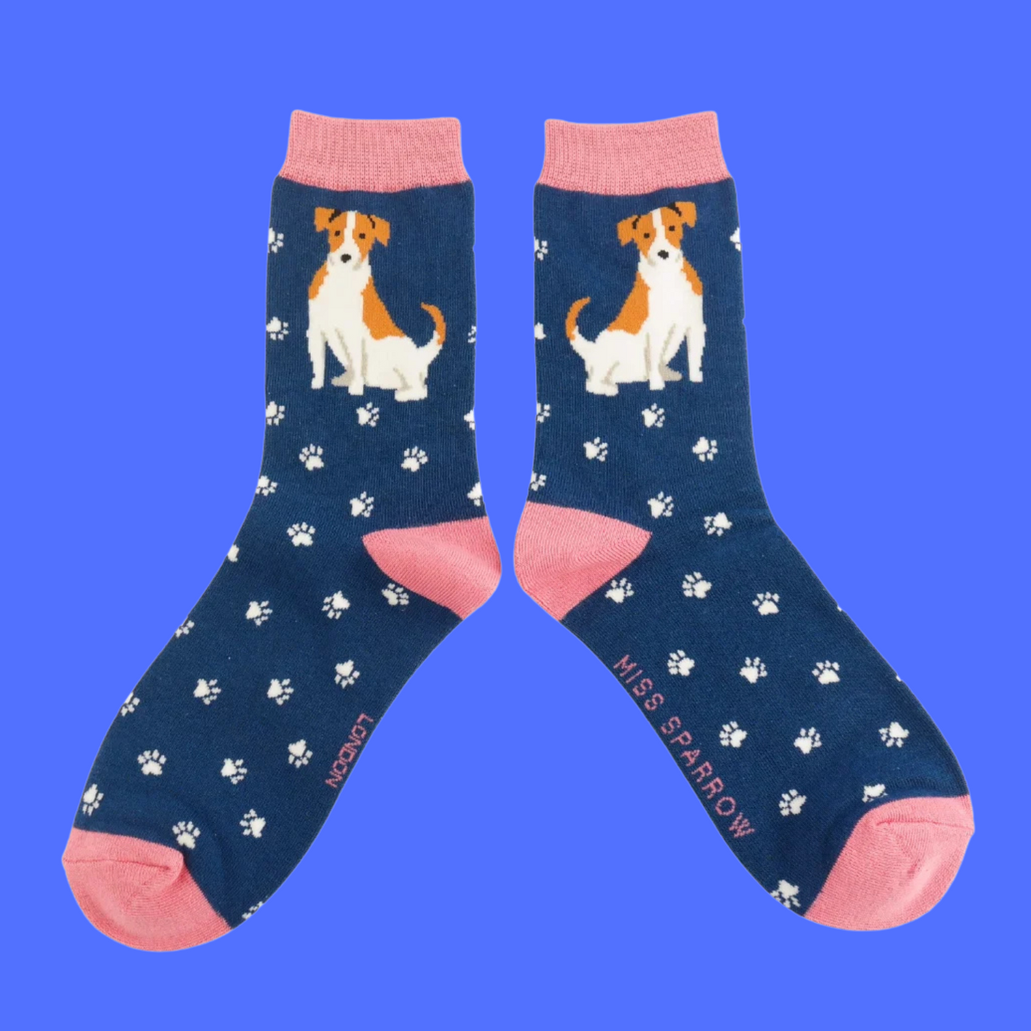 A pair of socks featuring a cute jack russell. Navy legs, pink heel, toe and cuff.