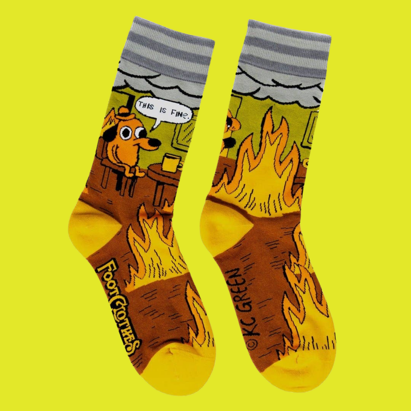 A pair of socks featuring a design by KC Green. Brown flaming legs, yellow heel, toe and cuff.