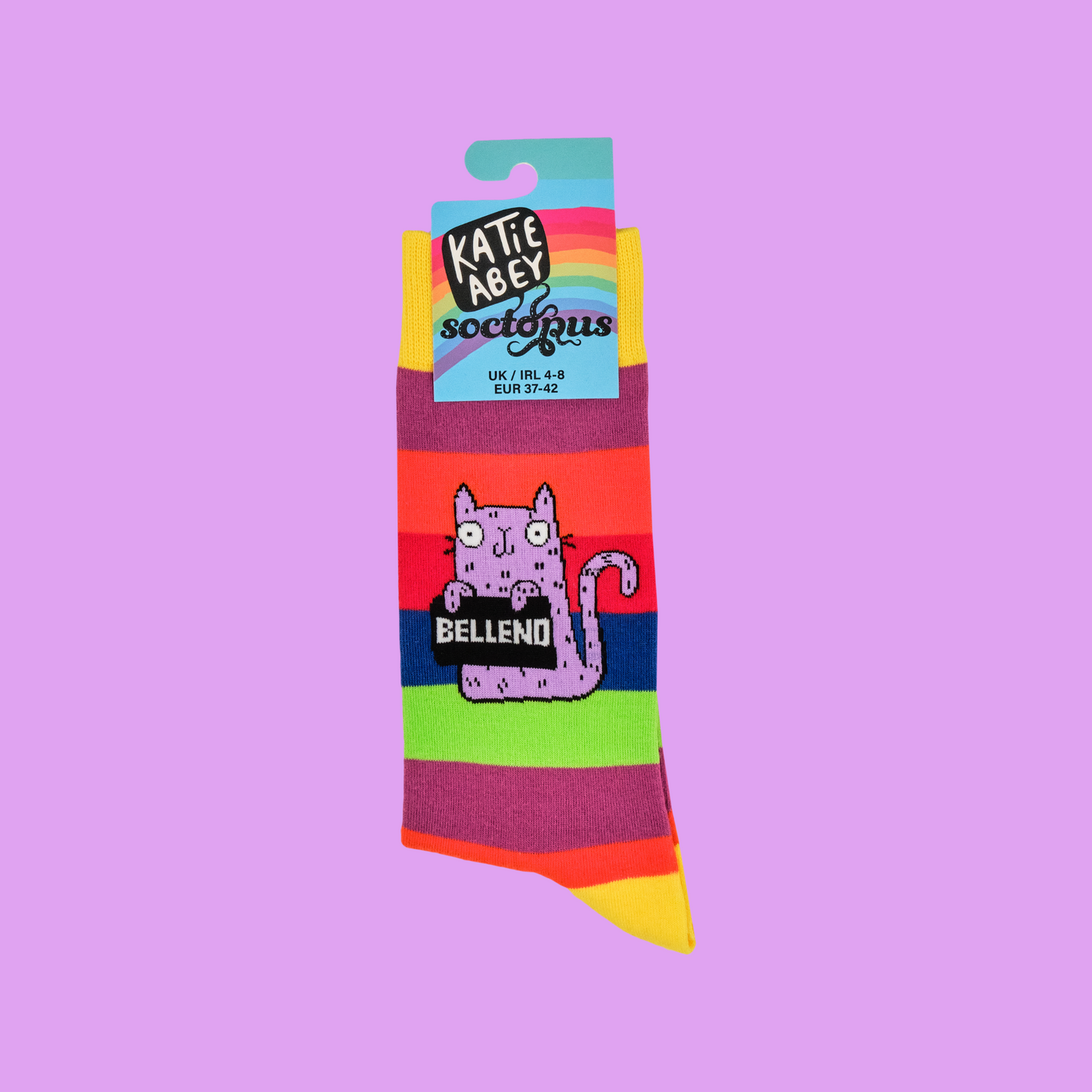 A pair of socks designed by artist Katy Abey,  featuring a cat holding a sign that says Bellend.
