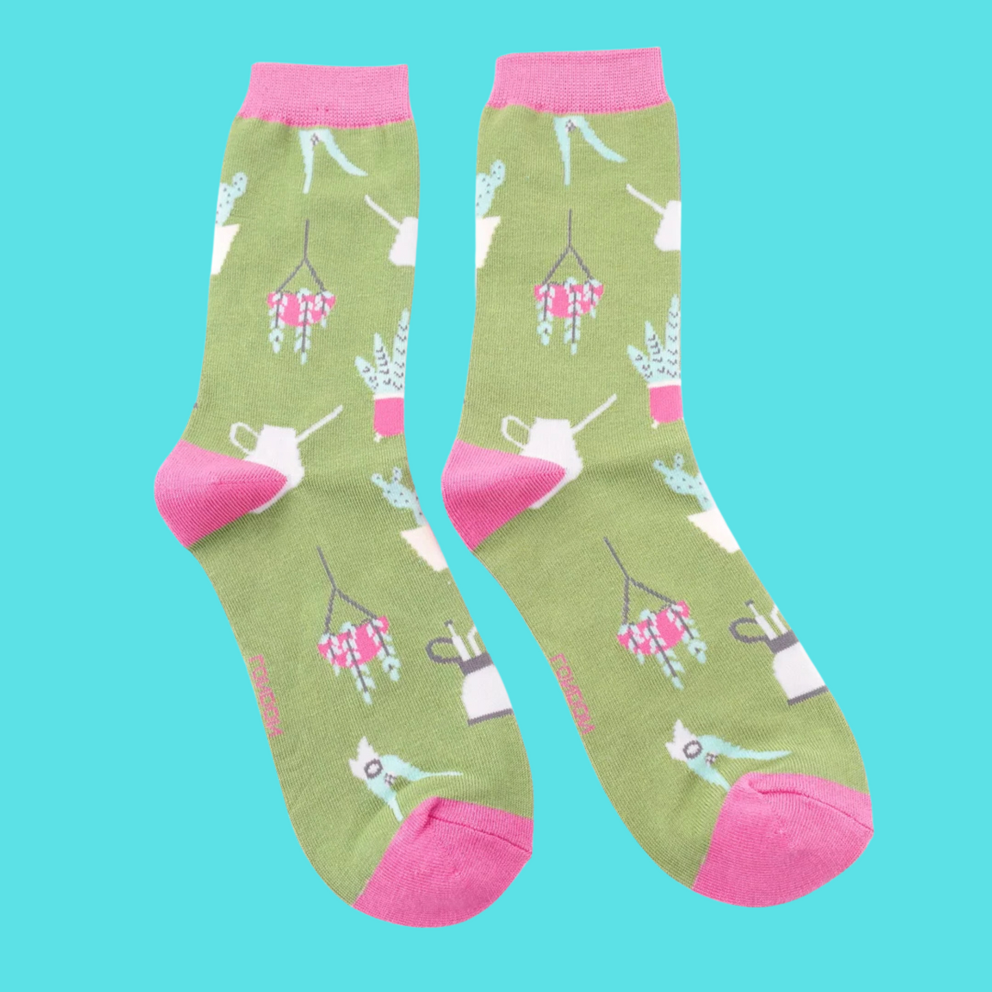 House Plants Bamboo Socks - Miss Sparrow. A pair of socks with a house plant motif. Green legs, pink heel, toe and cuff.