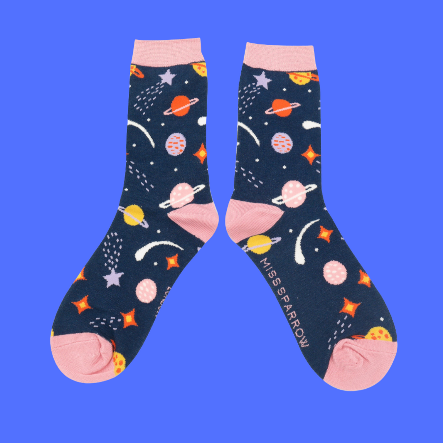 Space Bamboo Socks - Miss Sparrow. A pair of socks with a fun sce and planets theme. Blue legs, pink heel, toe and cuff.