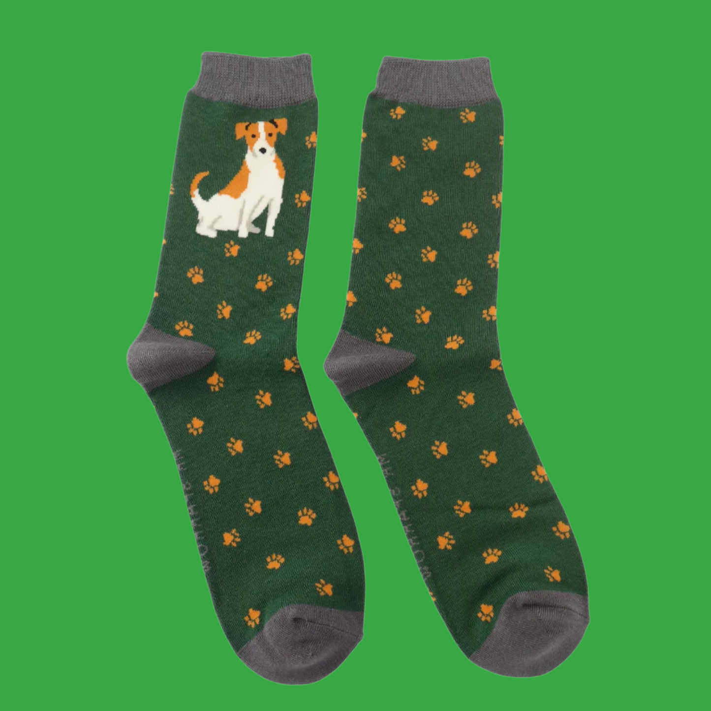 A pair of socks featuring a cute jack russell. Dark green legs, grey heel, toe and cuff.