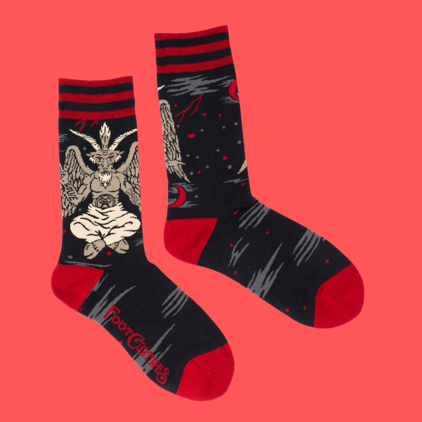 A pair of socks featuring baphomet. Black legs, red heel, toe and cuff.