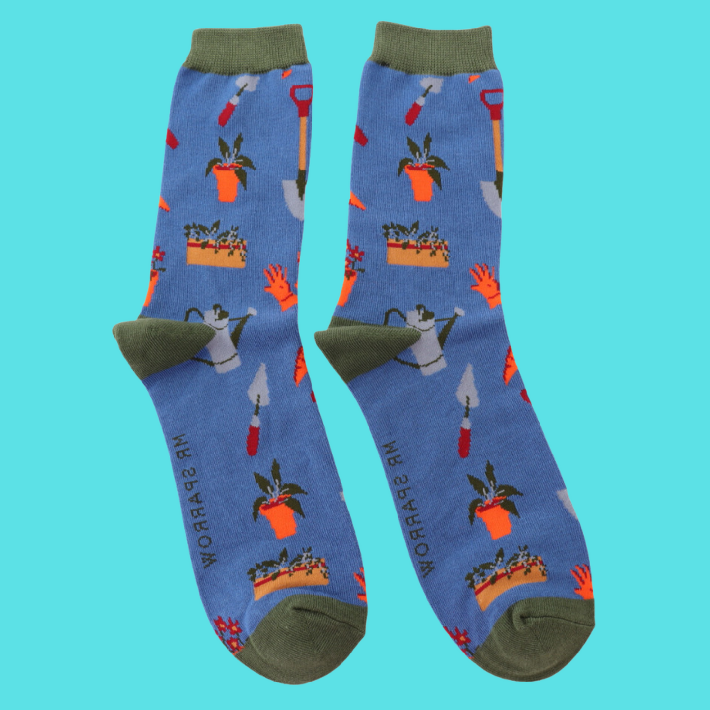 A pair of socks featuring gardeners tools, blue legs, grey heel, toe and cuff.