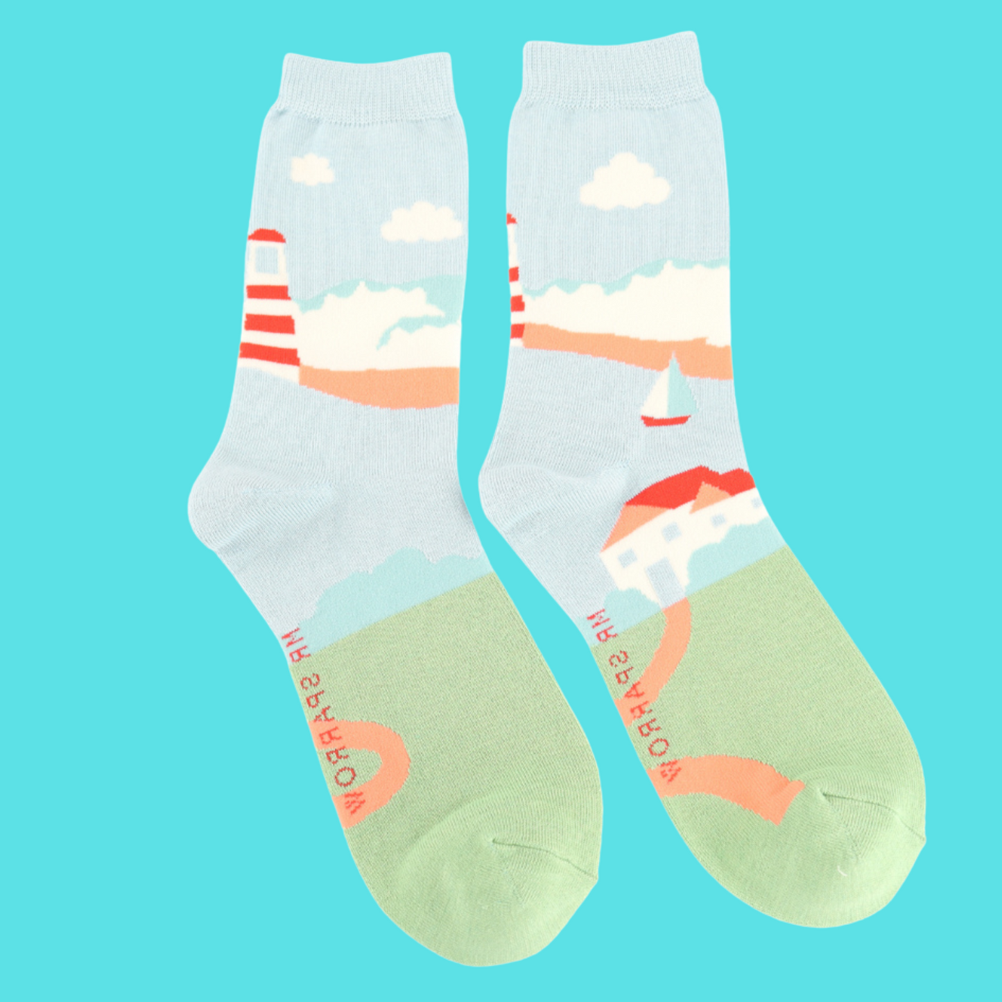 Seascape Bamboo Socks - Miss Sparrow. A pair of socks with a seaside motif.